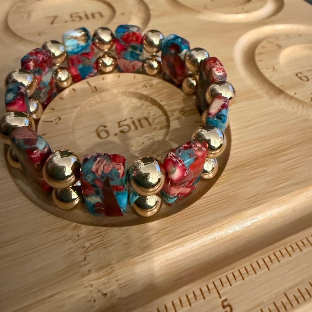 Gold beads and  Calsilica multi-coloured Beaded Bracelet